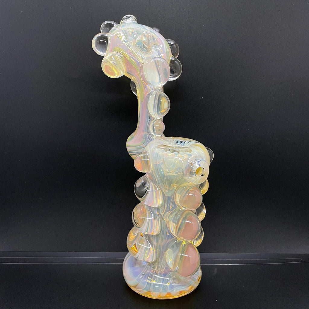 This is a hand blown glass piece that's hollow and has no holes